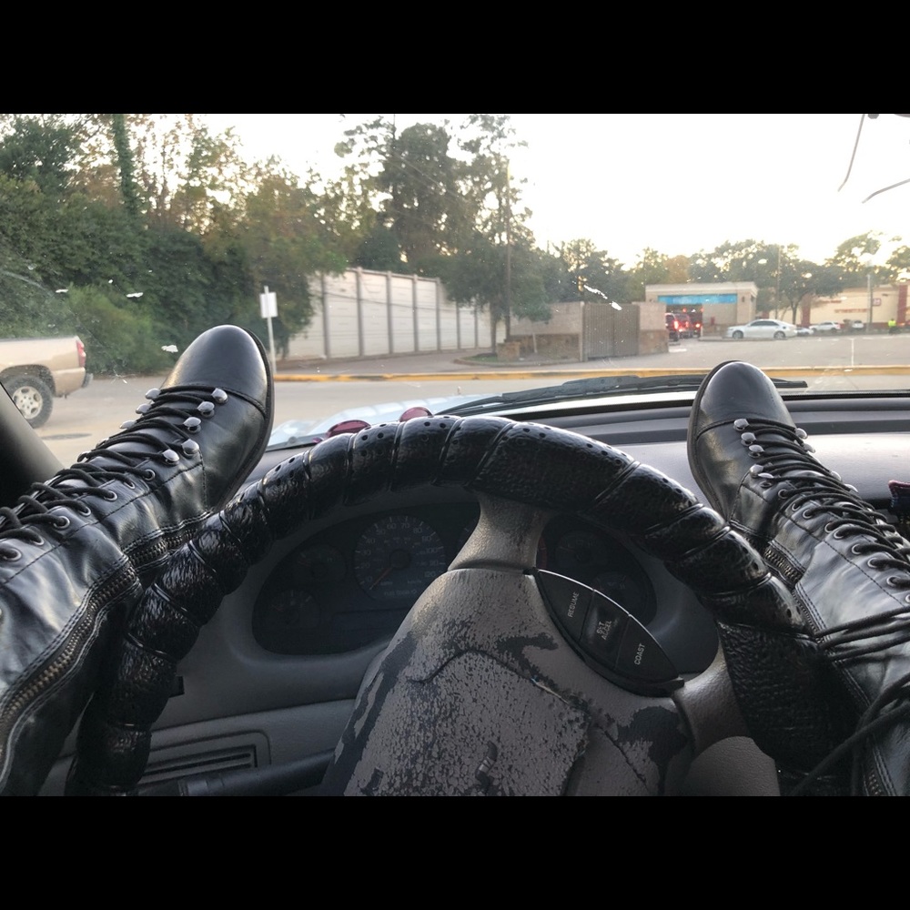 Knee high lace up black boots